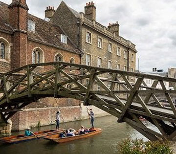 The Mathematical Bridge in Cambridge, with punts in the background