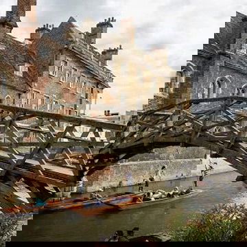 The Mathematical Bridge in Cambridge, with punts in the background
