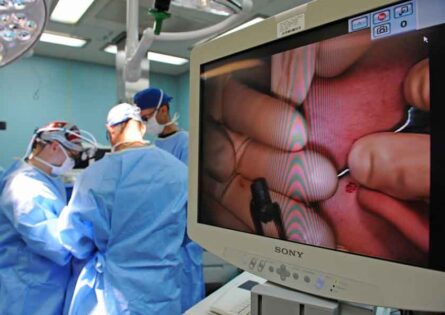 Surgeons operating during surgery