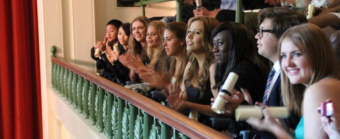 Image shows ORA students at graduation. 