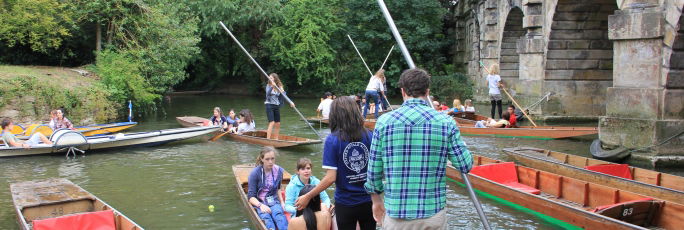 Image shows students and counsellors going punting. 